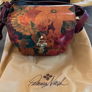 Purse Patricia Nash strap is 4 feet Long and adjustable